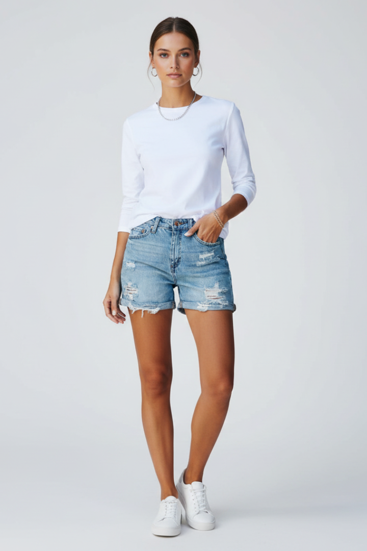 Women's Distressed Denim Shorts with Decorative Fringes in Blue - View 2.0 | Roselva