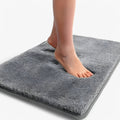 Absorbent and non-slip bath mat
