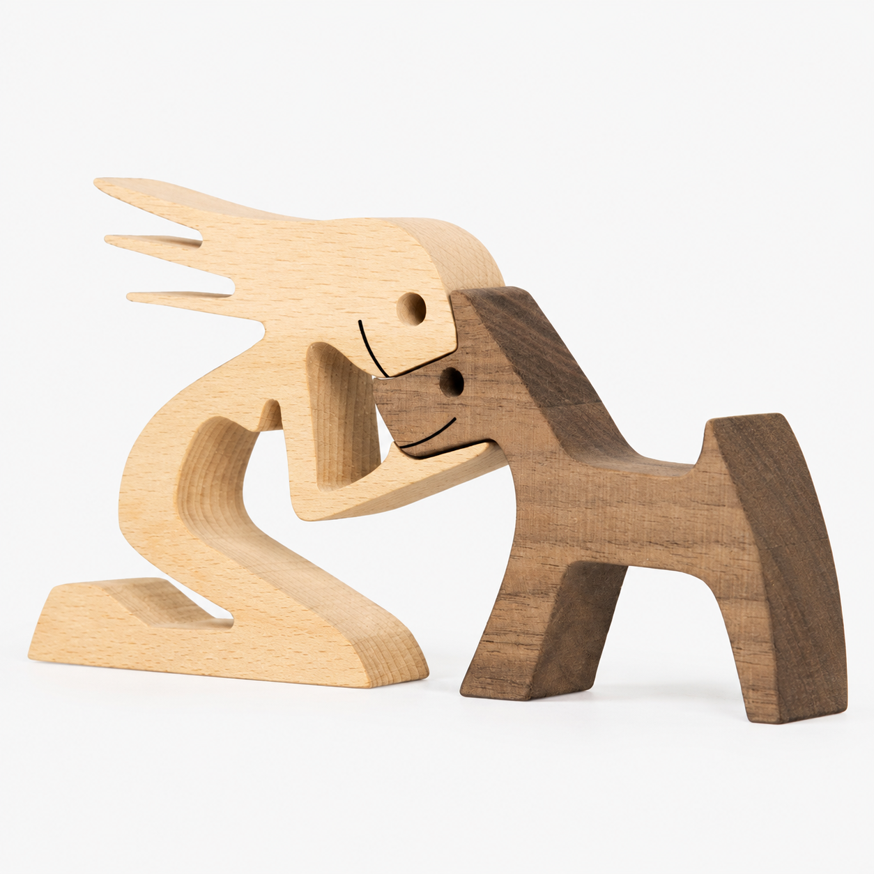 Wooden sculpture of person with dog, minimalist home decoration