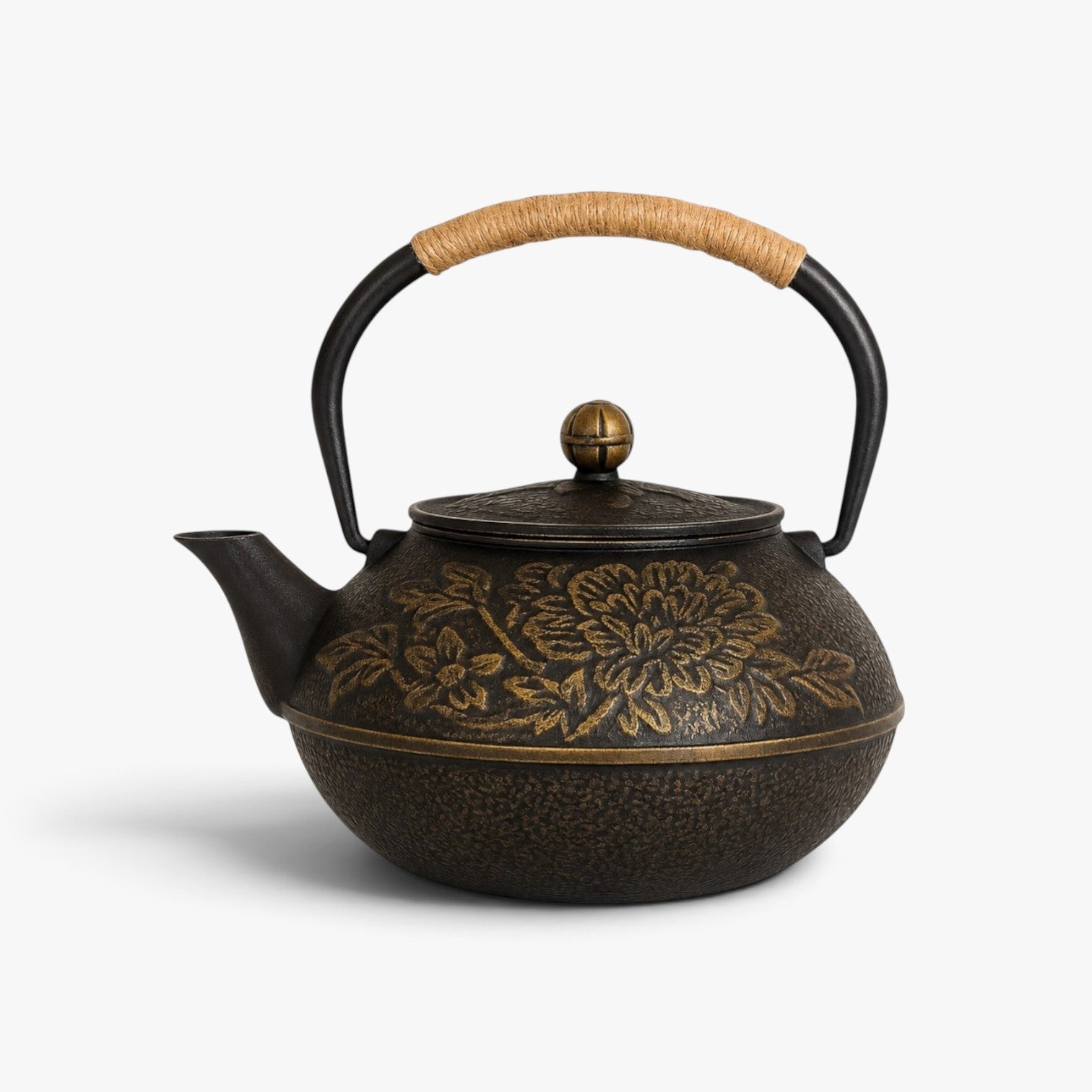 Roselva Japanese cast iron tetsubin teapot with gold floral relief engravings and a rope-wrapped handle.