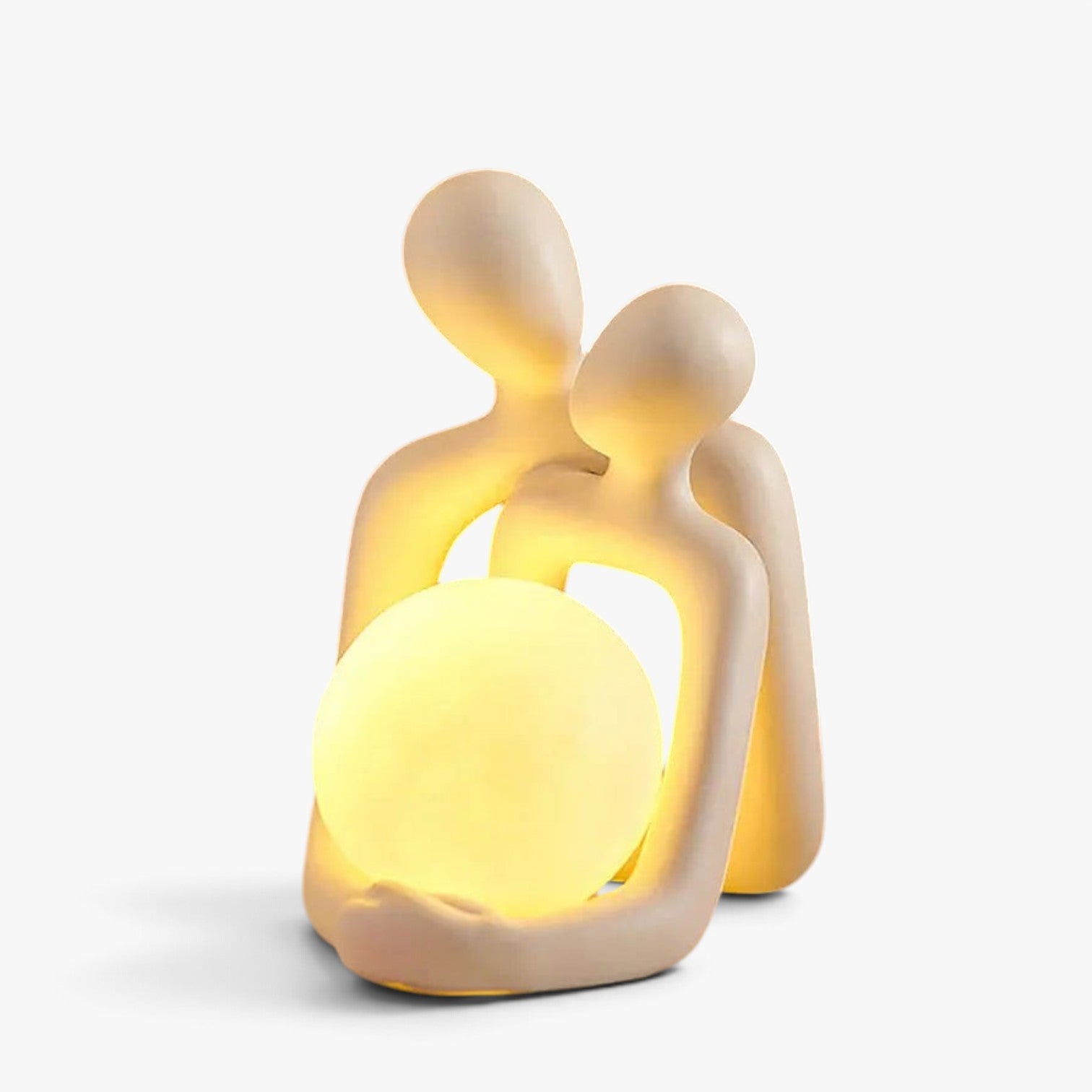 Roselva Nordic couple figurine in cream resin holding a glowing warm light sphere, symbolizing love and unity.